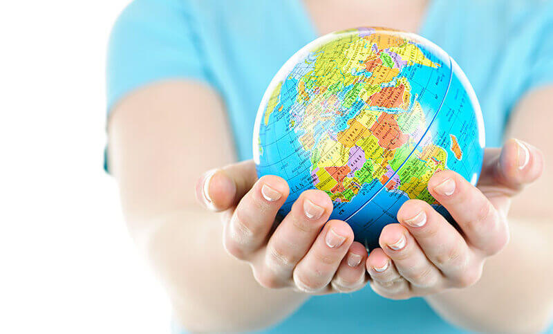 holding a globe